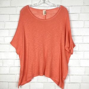 Anthropologie brand Francesca’s Orange Knit top
